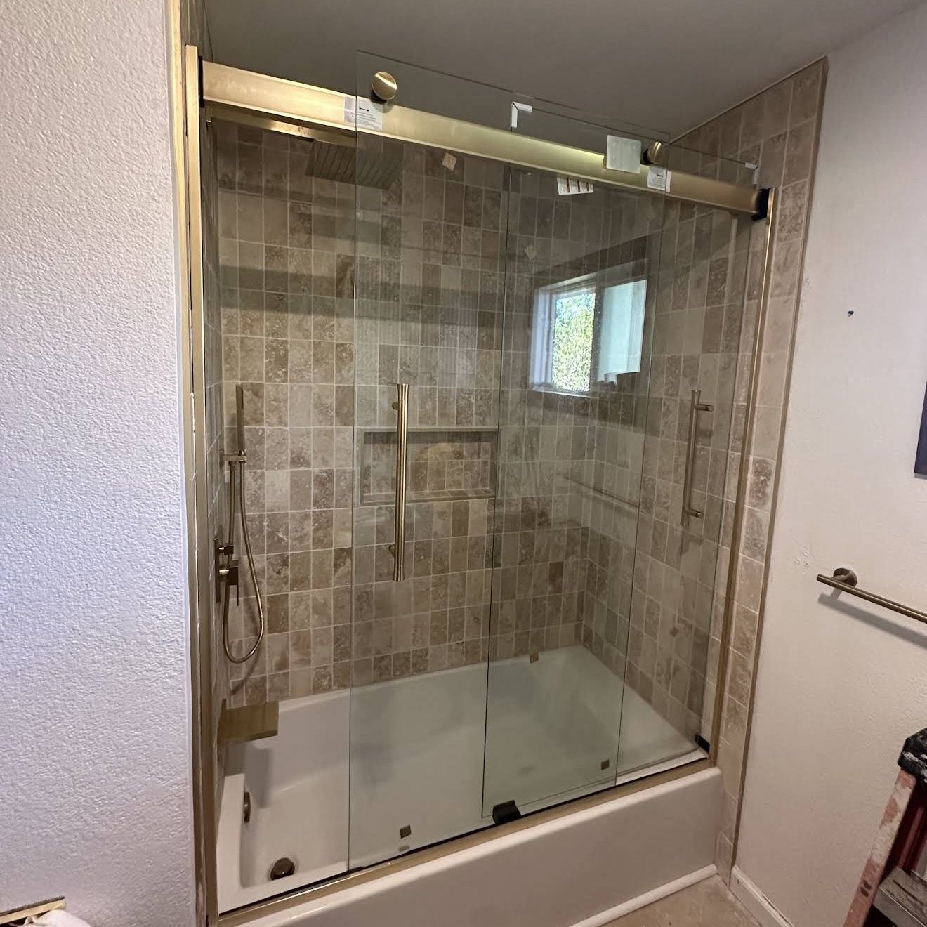 Finished shower with glass doors